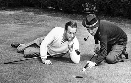 Dec. 8, 1946: Bob Hope admires technique of Bing Crosby in promotion photo for golf exhibition in Inglewood. Hope and Crosby also enterained guests at the Times Sports Award Dinner on Dec. 26, 1946.