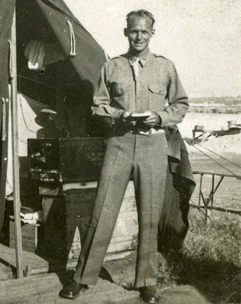 B-20.5-011-Phil Westdahl in front of tent copy